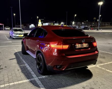 Красный БМВ Х6, объемом двигателя 3 л и пробегом 220 тыс. км за 16000 $, фото 1 на Automoto.ua