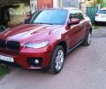 Красный БМВ Х6, объемом двигателя 3 л и пробегом 207 тыс. км за 15000 $, фото 1 на Automoto.ua