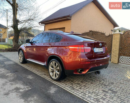 Красный БМВ Х6, объемом двигателя 3 л и пробегом 240 тыс. км за 15000 $, фото 2 на Automoto.ua