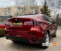 Красный БМВ Х6, объемом двигателя 3 л и пробегом 235 тыс. км за 14999 $, фото 6 на Automoto.ua