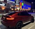 Красный БМВ Х6, объемом двигателя 3 л и пробегом 220 тыс. км за 16000 $, фото 1 на Automoto.ua