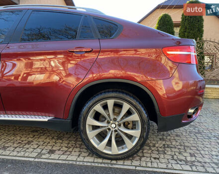 Красный БМВ Х6, объемом двигателя 3 л и пробегом 240 тыс. км за 15000 $, фото 10 на Automoto.ua