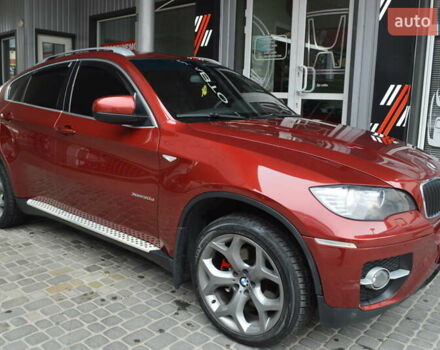 Красный БМВ Х6, объемом двигателя 3 л и пробегом 249 тыс. км за 15900 $, фото 1 на Automoto.ua