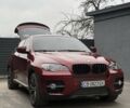 Красный БМВ Х6, объемом двигателя 3 л и пробегом 182 тыс. км за 15550 $, фото 1 на Automoto.ua