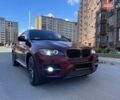 Красный БМВ Х6, объемом двигателя 3 л и пробегом 187 тыс. км за 12999 $, фото 1 на Automoto.ua