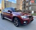 Красный БМВ Х6, объемом двигателя 3 л и пробегом 187 тыс. км за 12999 $, фото 1 на Automoto.ua