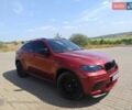 Красный БМВ Х6, объемом двигателя 4.39 л и пробегом 174 тыс. км за 15000 $, фото 1 на Automoto.ua