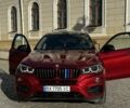 Червоний БМВ Х6, об'ємом двигуна 3 л та пробігом 317 тис. км за 25000 $, фото 1 на Automoto.ua
