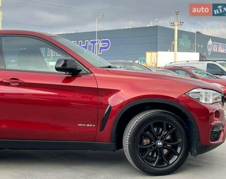 Красный БМВ Х6, объемом двигателя 3 л и пробегом 112 тыс. км за 41390 $, фото 4 на Automoto.ua