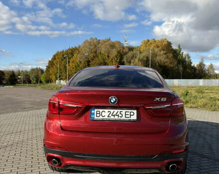 Красный БМВ Х6, объемом двигателя 2.99 л и пробегом 111 тыс. км за 40500 $, фото 6 на Automoto.ua