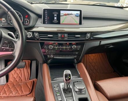 Красный БМВ Х6, объемом двигателя 3 л и пробегом 112 тыс. км за 41390 $, фото 27 на Automoto.ua