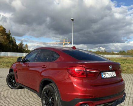 Красный БМВ Х6, объемом двигателя 2.99 л и пробегом 111 тыс. км за 40500 $, фото 5 на Automoto.ua