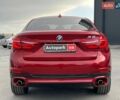 Красный БМВ Х6, объемом двигателя 3 л и пробегом 112 тыс. км за 41390 $, фото 8 на Automoto.ua