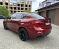Красный БМВ Х6, объемом двигателя 3 л и пробегом 157 тыс. км за 42500 $, фото 2 на Automoto.ua