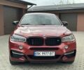 Красный БМВ Х6, объемом двигателя 3 л и пробегом 157 тыс. км за 42500 $, фото 1 на Automoto.ua