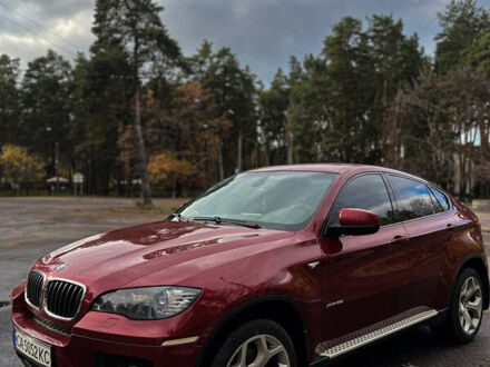 Красный БМВ Х6, объемом двигателя 3 л и пробегом 230 тыс. км за 14300 $, фото 1 на Automoto.ua