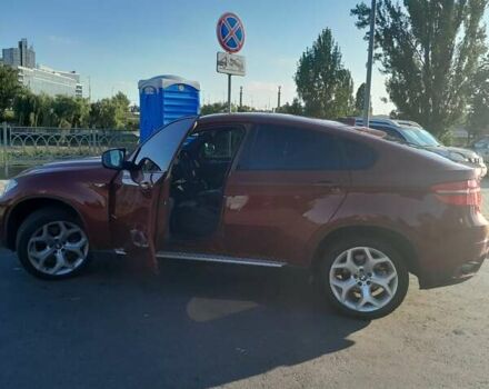 Красный БМВ Х6, объемом двигателя 3 л и пробегом 190 тыс. км за 16000 $, фото 1 на Automoto.ua