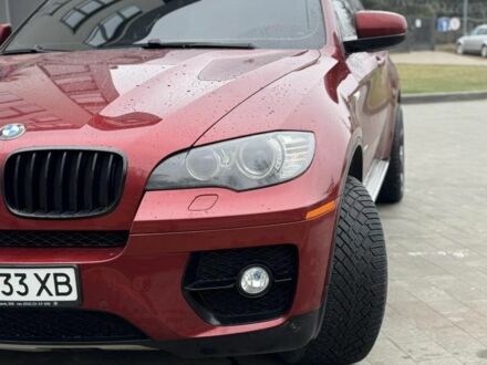 Красный БМВ Х6, объемом двигателя 3 л и пробегом 220 тыс. км за 12000 $, фото 1 на Automoto.ua