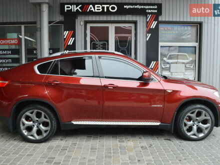 Красный БМВ Х6, объемом двигателя 3 л и пробегом 249 тыс. км за 15900 $, фото 1 на Automoto.ua