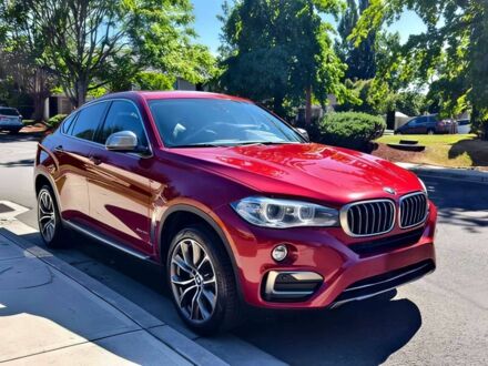Красный БМВ Х6, объемом двигателя 3 л и пробегом 76 тыс. км за 7400 $, фото 1 на Automoto.ua