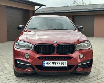 Красный БМВ Х6, объемом двигателя 3 л и пробегом 157 тыс. км за 42500 $, фото 1 на Automoto.ua