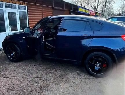 Синий БМВ Х6, объемом двигателя 3 л и пробегом 217 тыс. км за 15000 $, фото 1 на Automoto.ua