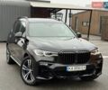 Черный БМВ X7, объемом двигателя 2.99 л и пробегом 124 тыс. км за 74900 $, фото 1 на Automoto.ua