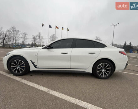 Белый БМВ i4, объемом двигателя 0 л и пробегом 50 тыс. км за 50500 $, фото 1 на Automoto.ua