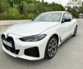 Белый БМВ i4, объемом двигателя 0 л и пробегом 3 тыс. км за 48700 $, фото 1 на Automoto.ua