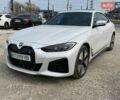 Белый БМВ i4, объемом двигателя 0 л и пробегом 50 тыс. км за 28990 $, фото 1 на Automoto.ua