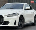 Белый БМВ i4, объемом двигателя 0 л и пробегом 18 тыс. км за 32650 $, фото 3 на Automoto.ua
