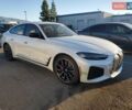Белый БМВ i4, объемом двигателя 0 л и пробегом 84 тыс. км за 15600 $, фото 3 на Automoto.ua