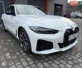 Белый БМВ i4, объемом двигателя 0 л и пробегом 2 тыс. км за 42000 $, фото 1 на Automoto.ua