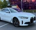 Белый БМВ i4, объемом двигателя 0 л и пробегом 48 тыс. км за 32990 $, фото 1 на Automoto.ua