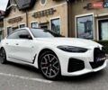 Белый БМВ i4, объемом двигателя 0 л и пробегом 45 тыс. км за 55900 $, фото 1 на Automoto.ua