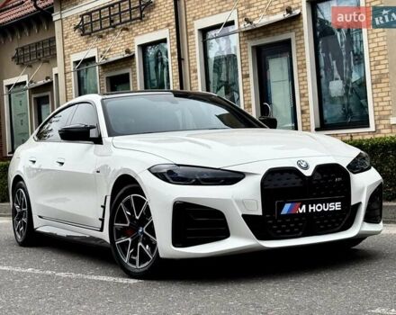 Белый БМВ i4, объемом двигателя 0 л и пробегом 45 тыс. км за 55900 $, фото 1 на Automoto.ua