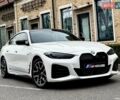 Белый БМВ i4, объемом двигателя 0 л и пробегом 45 тыс. км за 55900 $, фото 1 на Automoto.ua