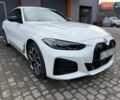 Белый БМВ i4, объемом двигателя 0 л и пробегом 2 тыс. км за 48500 $, фото 1 на Automoto.ua