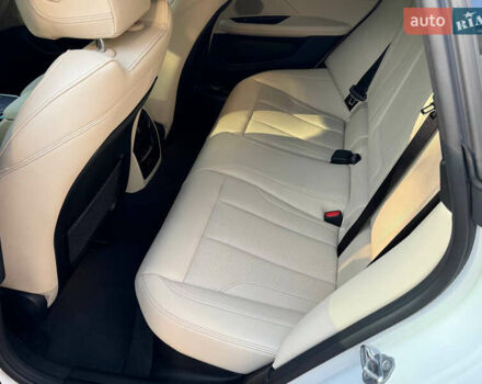 Белый БМВ i4, объемом двигателя 0 л и пробегом 25 тыс. км за 40999 $, фото 18 на Automoto.ua