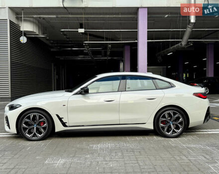 Белый БМВ i4, объемом двигателя 0 л и пробегом 35 тыс. км за 50700 $, фото 2 на Automoto.ua