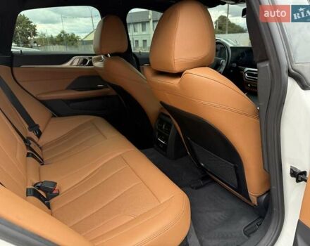 Белый БМВ i4, объемом двигателя 0 л и пробегом 31 тыс. км за 34900 $, фото 2 на Automoto.ua