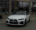 Белый БМВ i4, объемом двигателя 0 л и пробегом 12 тыс. км за 34800 $, фото 1 на Automoto.ua
