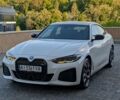 Белый БМВ i4, объемом двигателя 0 л и пробегом 2 тыс. км за 42700 $, фото 1 на Automoto.ua
