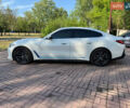 Белый БМВ i4, объемом двигателя 0 л и пробегом 25 тыс. км за 40999 $, фото 1 на Automoto.ua
