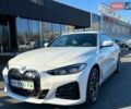 Белый БМВ i4, объемом двигателя 0 л и пробегом 11 тыс. км за 34000 $, фото 1 на Automoto.ua