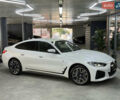 Белый БМВ i4, объемом двигателя 0 л и пробегом 11 тыс. км за 39500 $, фото 1 на Automoto.ua
