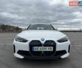 Белый БМВ i4, объемом двигателя 0 л и пробегом 14 тыс. км за 40900 $, фото 1 на Automoto.ua
