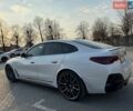 Белый БМВ i4, объемом двигателя 0 л и пробегом 12 тыс. км за 48500 $, фото 3 на Automoto.ua