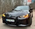 Черный БМВ i4, объемом двигателя 0 л и пробегом 92 тыс. км за 39000 $, фото 1 на Automoto.ua