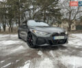 Черный БМВ i4, объемом двигателя 0 л и пробегом 61 тыс. км за 45000 $, фото 1 на Automoto.ua